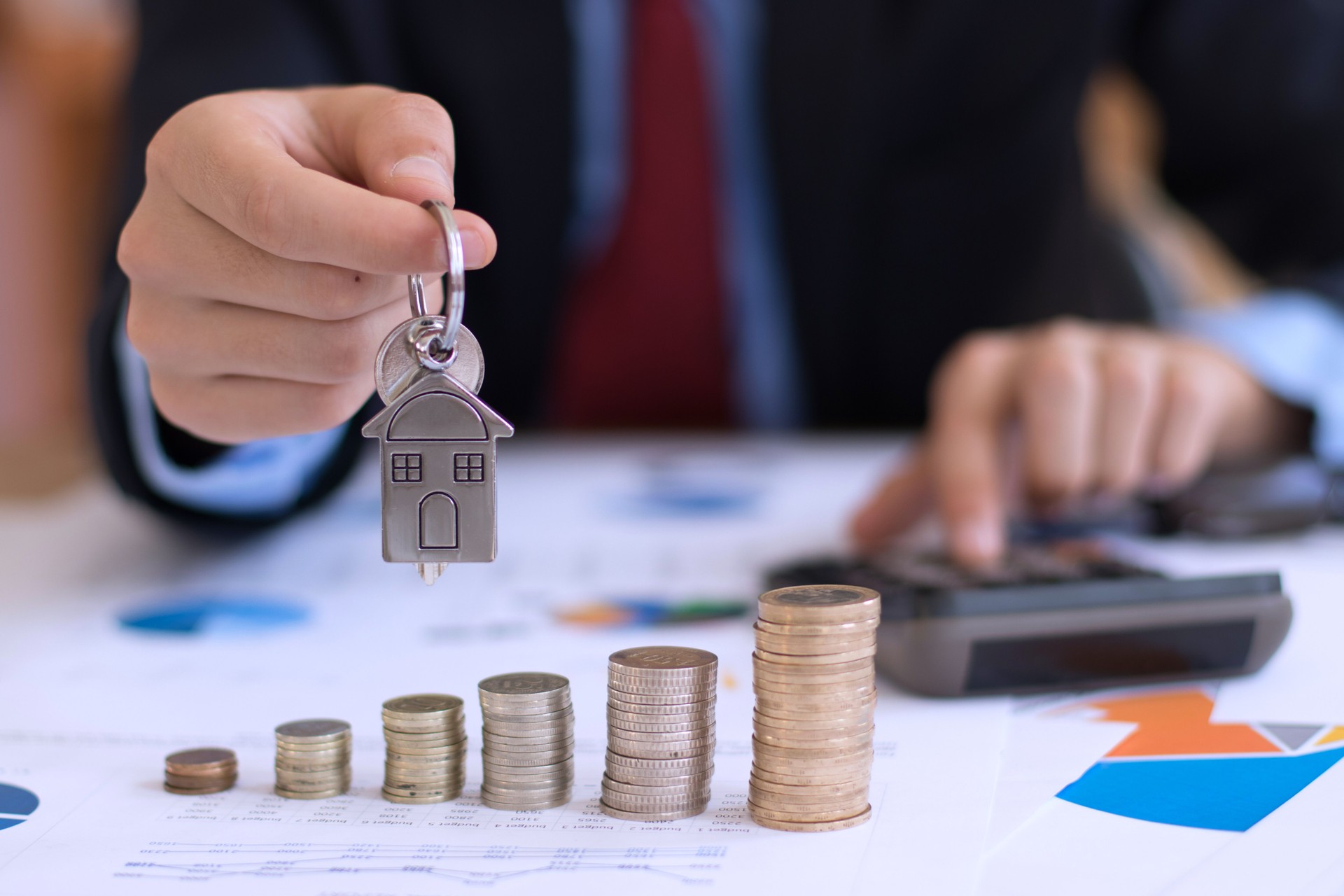 Real estate agent calculating